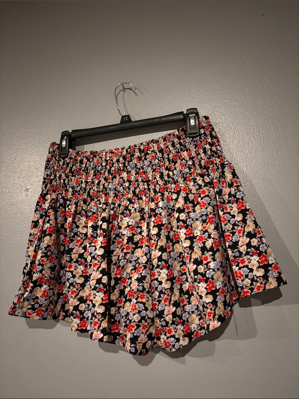 SHEIN Black Floral Smocked-Waist Skater Shorts with Red & Cream Blooms
